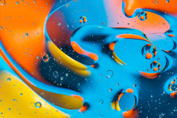 istock Abstract background with colorful gradient colors. Oil drops in water abstract psychedelic pattern image. 1028148250