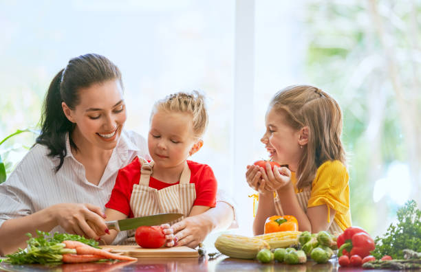 istock Happy family in the kitchen. 1028148286