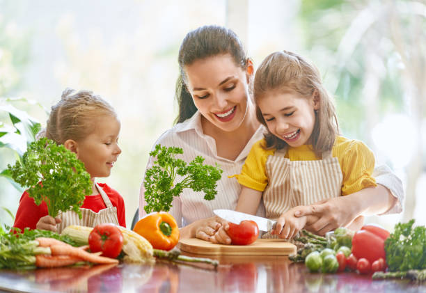 istock Happy family in the kitchen. 1028148354