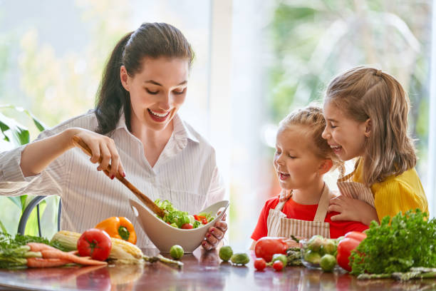 istock Happy family in the kitchen. 1028148360