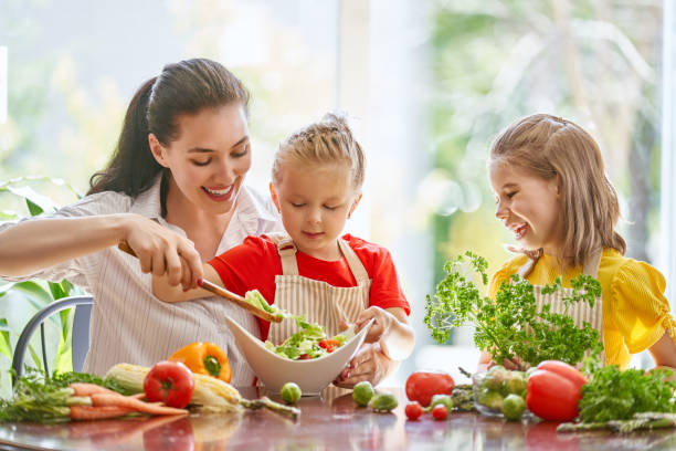 istock Happy family in the kitchen. 1028148388