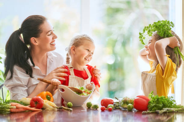 istock Happy family in the kitchen. 1028148418