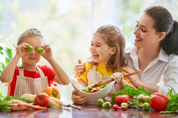istock Happy family in the kitchen. 1028148424