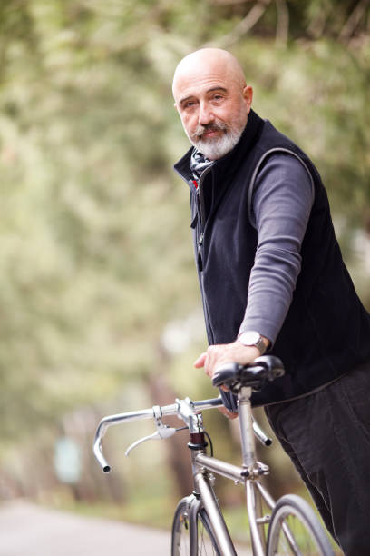 istock Senior Man With Bike 1028159362