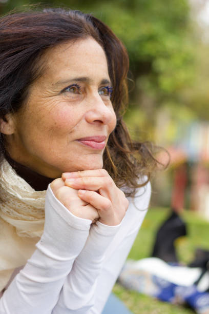 istock Visionary mature lady with hopeful, positive expression 1028160754