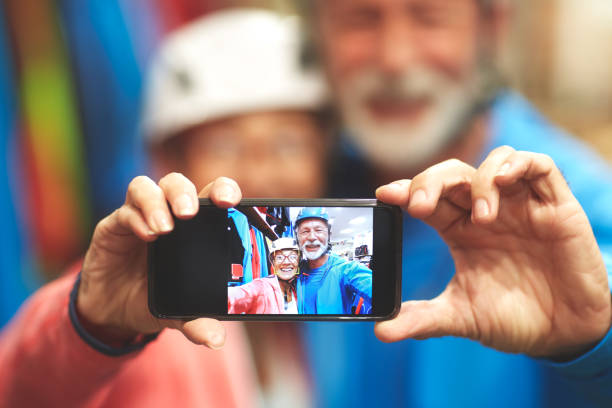 istock Senior couple shopping and taking selfie 1028164608