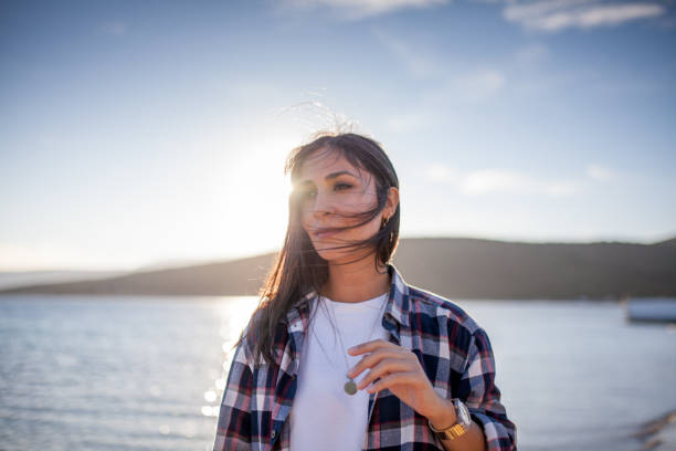 Young woman enjoying the sunset