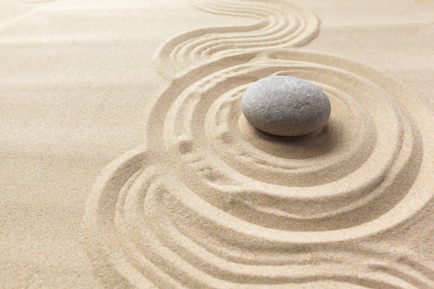 istock zen garden meditation stone background 1028184852