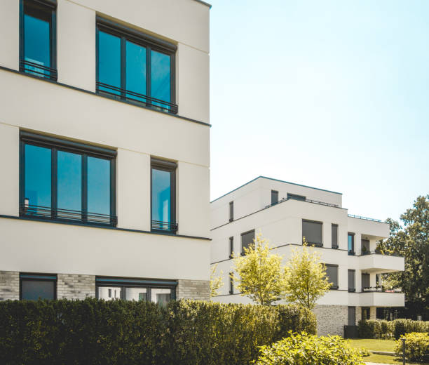 istock some modern buildings with white facade and copy space in the sky 1028184920