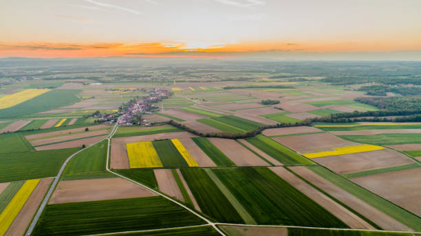 istock Aerial view of fields and village 1028185052