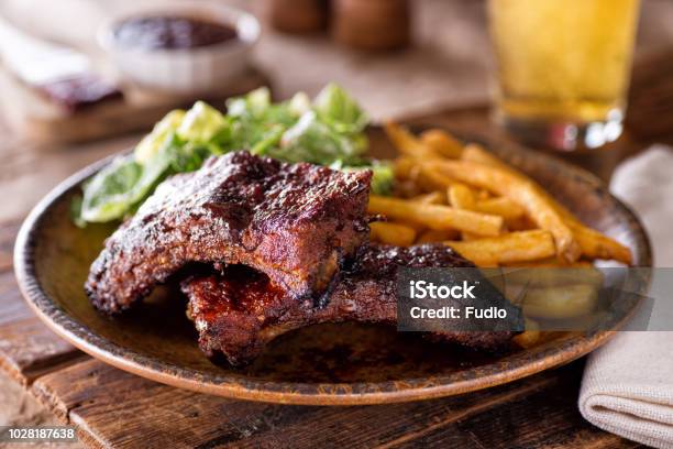Barbecued Ribs With Fries And Salad Stock Photo - Download Image Now - Barbecue - Meal, Rib - Food, Memphis - Tennessee