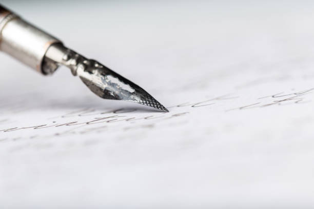 istock Fountain pen on an antique handwritten letter 1028188834