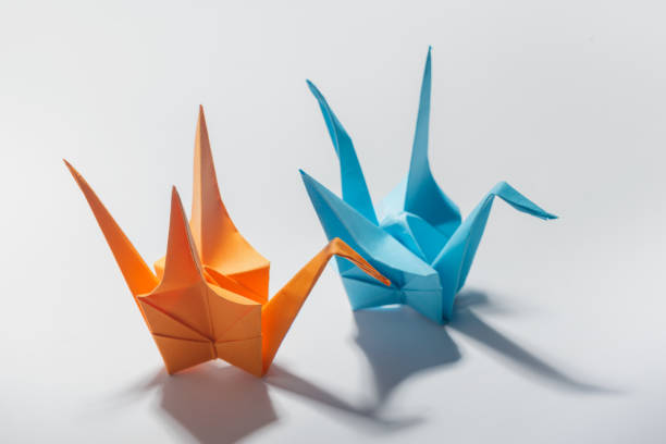 istock origami crane on white background 1028194766