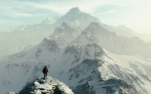 istock Conceptual image of a man hiker with backpack in front of a mountain 1028200644
