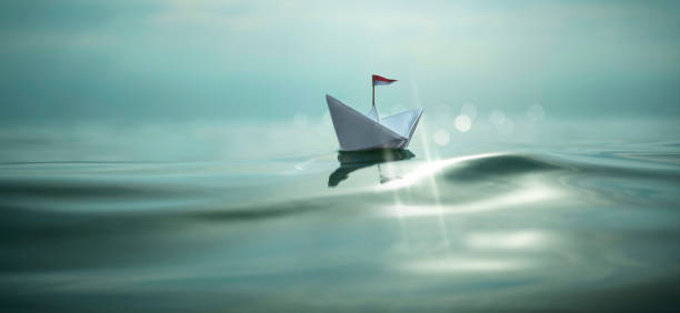 istock Paper Boat Bling-Bling Panorama 1028200836