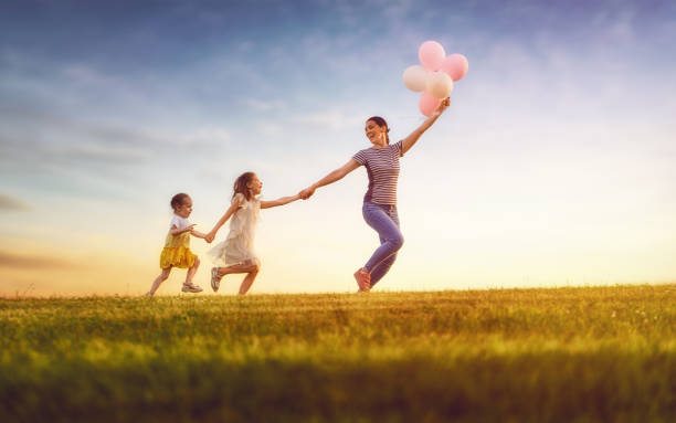 istock family playing outdoor 1028203608