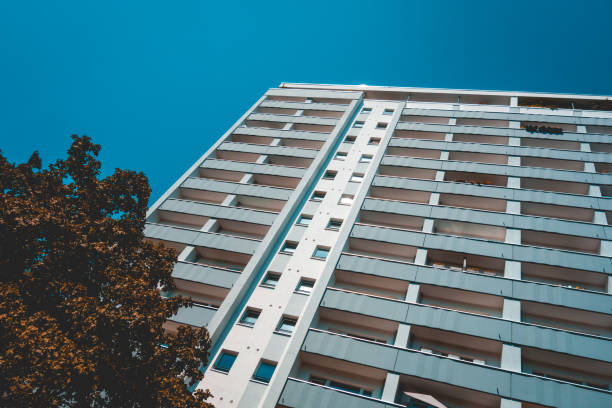 istock white plattenbau building from the vanishing point view 1028204456