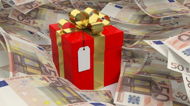 istock Gift box with golden ribbon set on Euros banknotes pile, 3d rendering 1028212776