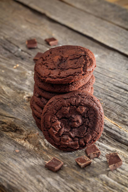 istock Soft chocolate cookies set on old wooden surface 1028212920