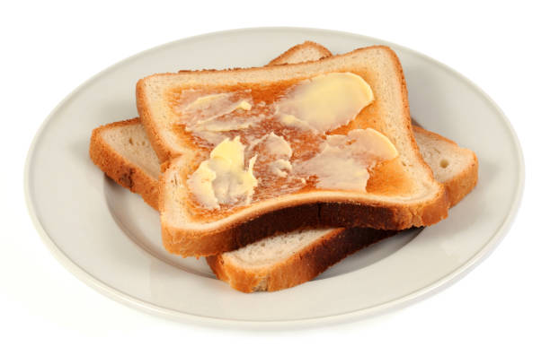 istock Buttered toast on a plate 1028216260