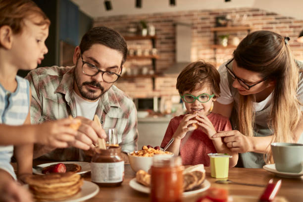 istock Family enjoying breakfast 1028220754