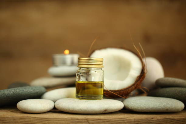 istock coconut oil for massage pebble candle 1028221460