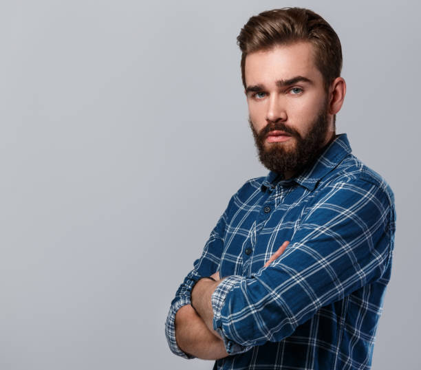 istock Handsome bearded man in checkered shirt 1028232924