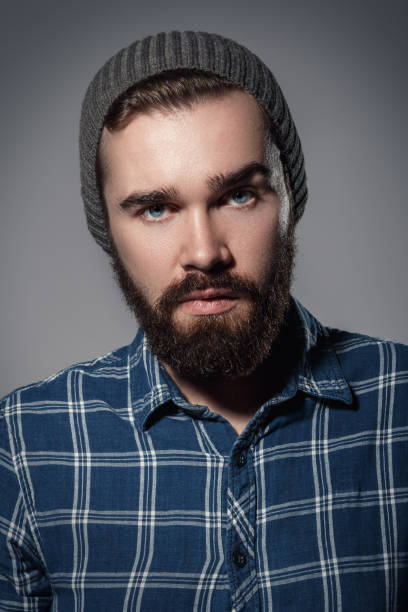 istock Handsome bearded man in checkered shirt 1028233220