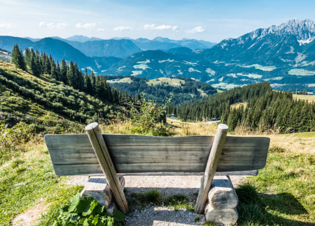 bench at a mountain bench on the hartkaiser mountain tyrol state austria stock pictures, royalty-free photos & images
