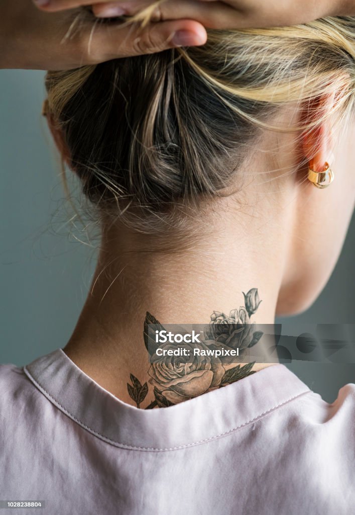 Back Neck Tattoo Of A Woman Stock Photo - Download Image Now - Tattoo,  Women, Neck - iStock