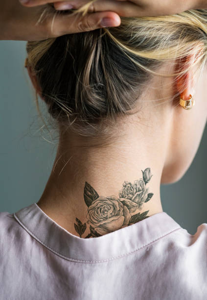 Back Neck Tattoo Of A Woman Stock Photo - Download Image Now - Tattoo, Women,  Neck - iStock