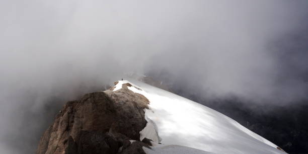 Alone at the top of Mount Marmolada, Italy stock photo