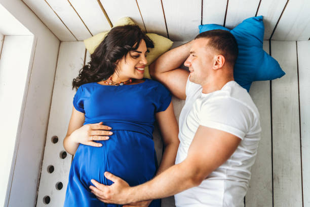 Pregnant girl with husband stock photo
