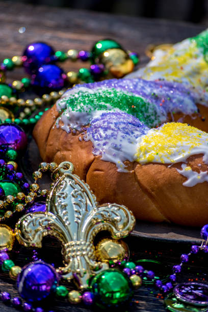 istock king cake surrounded by mardi gras decorations 1028266392