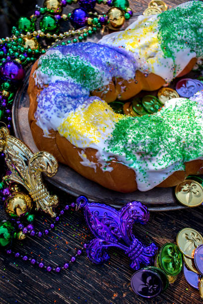 istock king cake surrounded by mardi gras decorations 1028266700