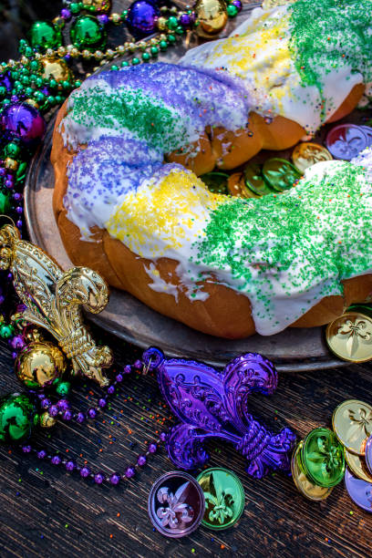 istock king cake surrounded by mardi gras decorations 1028266790