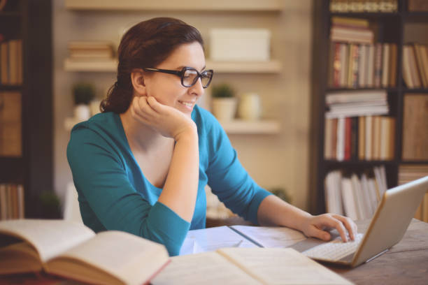 istock young woman working at home 1028266846