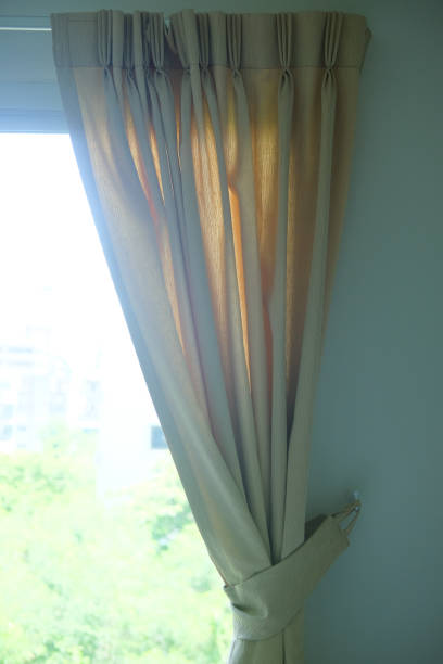 istock Curtain knob with bow decoration in home 1028271994