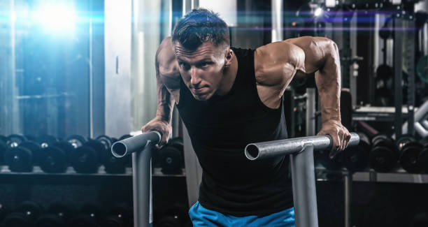 Man during workout in the gym stock photo