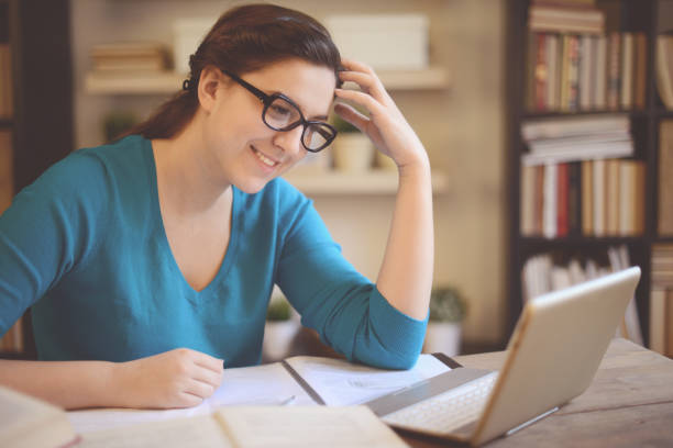 istock young woman working at home 1028273006