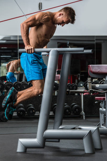 istock Man during workout in the gym 1028273540