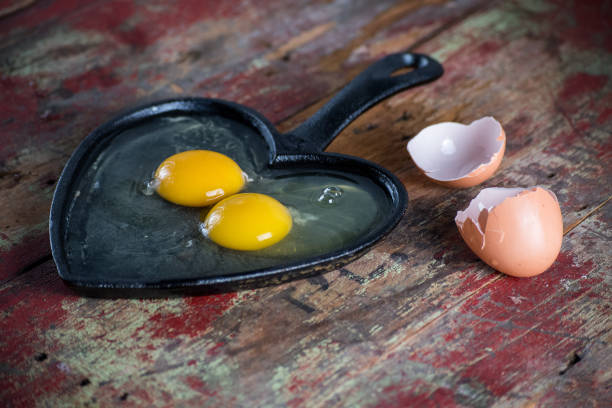 istock Valentines breakfast of two raw eggs and yolks 1028273734