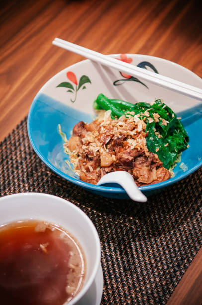 istock Chinese roasted pork noodle with brown soup 1028276058