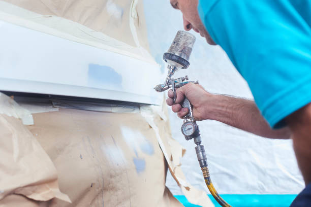 istock Car spray painting 1028277504