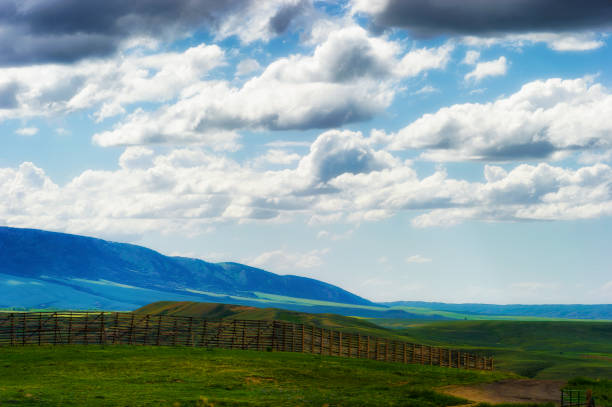 istock Wyoming Vast Landscape under dark clouds 1028278298
