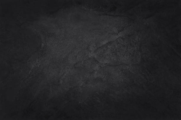 dunkelgraue schwarze schieferstruktur in natürlichem muster mit hoher auflösung für hintergrund- und designkunstwerk. schwarze steinmauer. - stein baumaterial stock-fotos und bilder