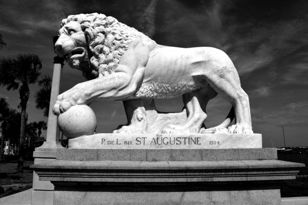 A statue of a friendly looking lion on the memorial to Admiral Lord Nelson in St Pauls Cathedral London.The lion has long been used as a symbol for the United Kingdom.
