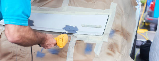 istock Using heat gun on car paint repair 1028281216