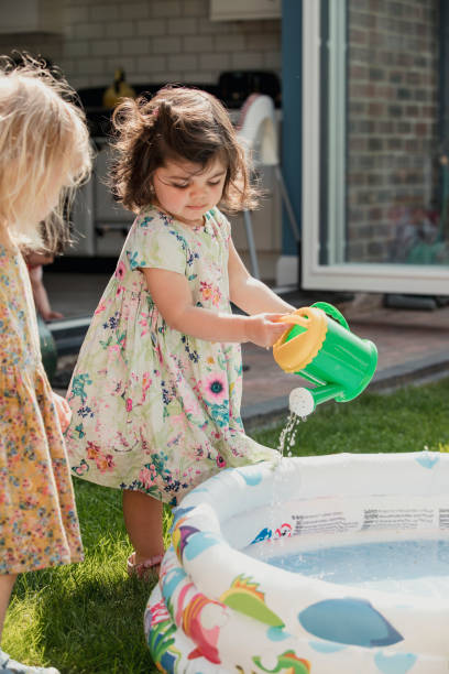 istock Pouring Water into the Pool 1028300798