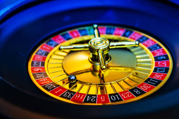 istock Casino playing roulette on green table 1028301198